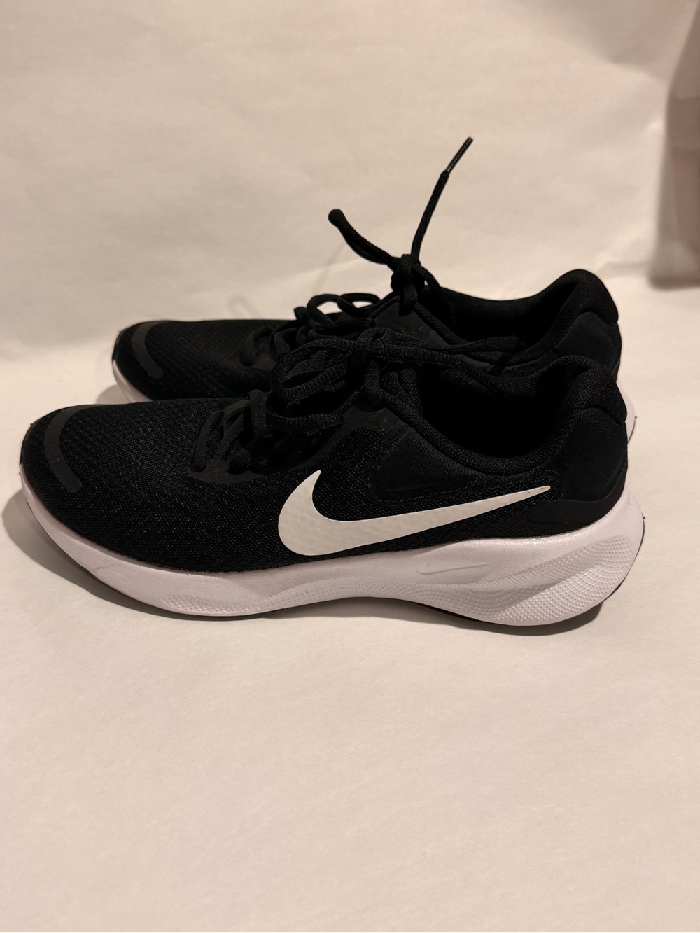 Nike Women's Black Athletic Shoes with White Swoosh